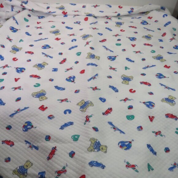 Fabric Toys Quilted Double Knit (extra warm) 60x72" (white background) yardage - Picture 2 of 4